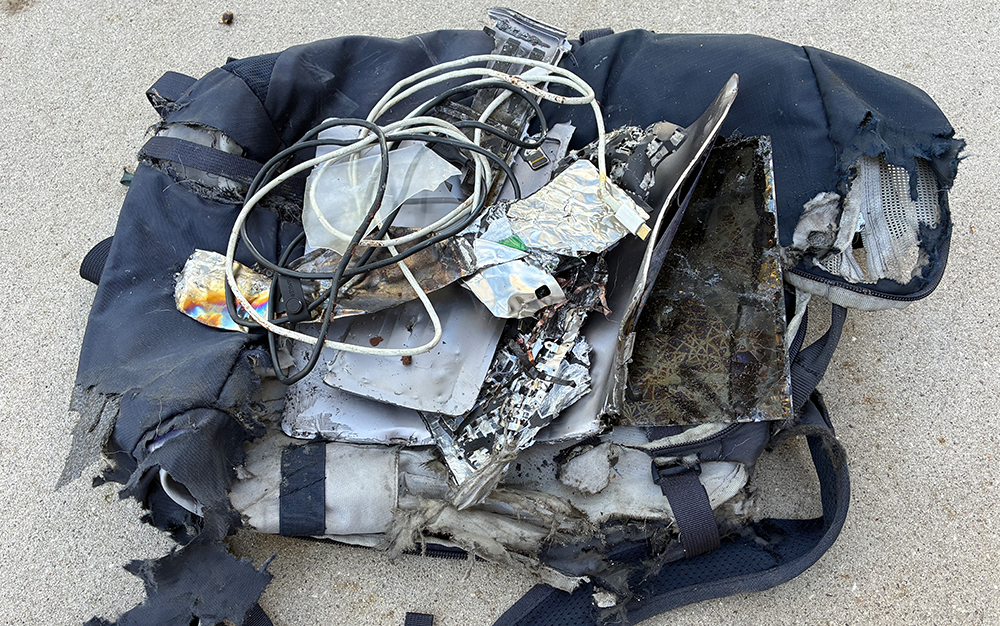 Bryan's demolished laptop and backpack - Seedhouse News Q3 2026